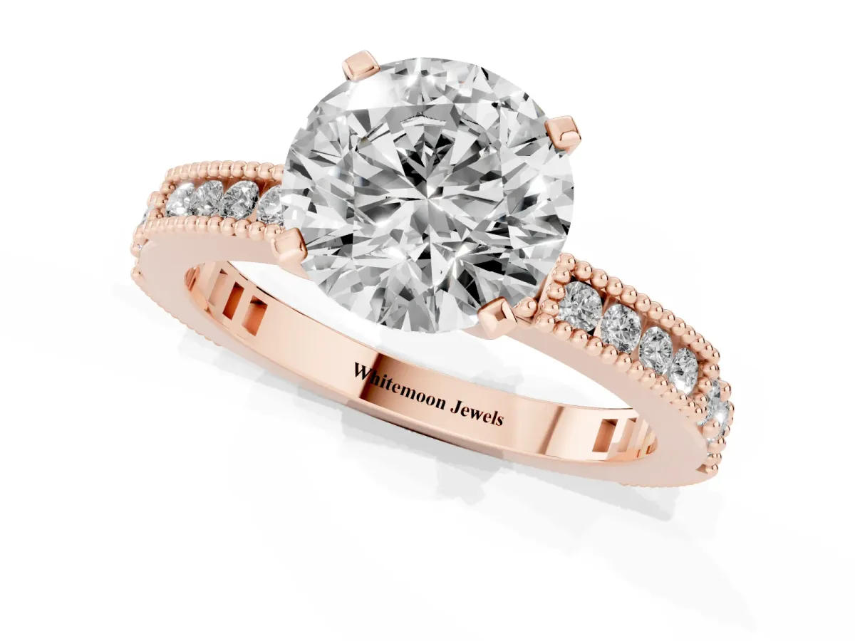 Round Cut Solitaire with Pavé Band and Four-Prong Setting Rose gold