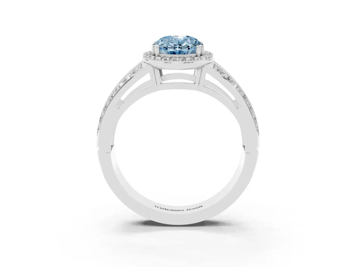 Fancy Blue Oval Cut Diamond Halo Ring with Split Shank Pavé Band and Four-Prong Setting White gold