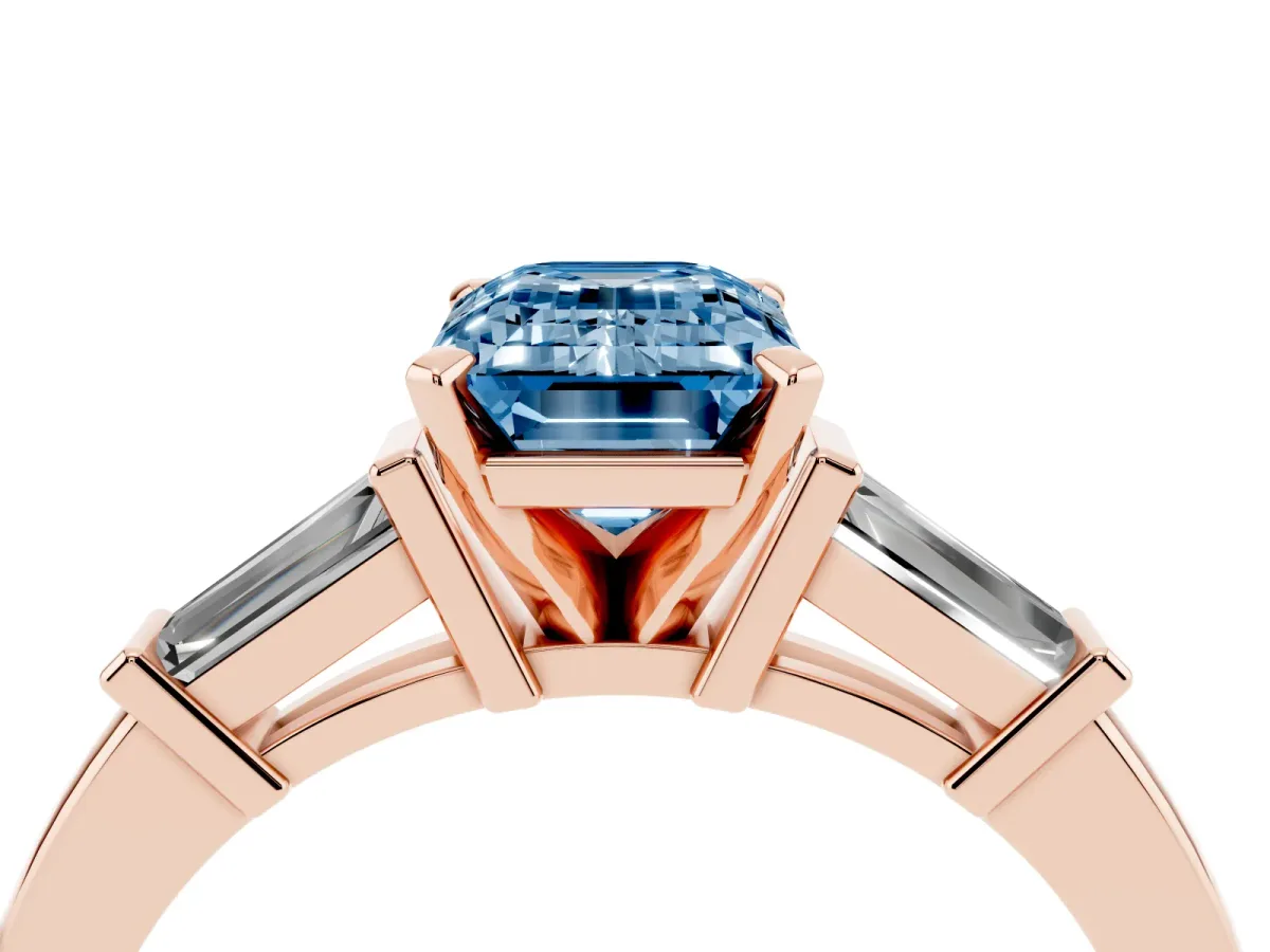 Fancy Blue Emerald Cut Cut Diamond Solitaire Ring with Tapered Baguette Accents and Four-Prong Setting Rose gold