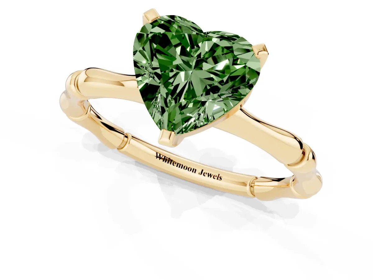 Fancy Green Heart Cut Solitaire Diamond Ring with Bamboo Band and Four-Prong Setting Yellow gold