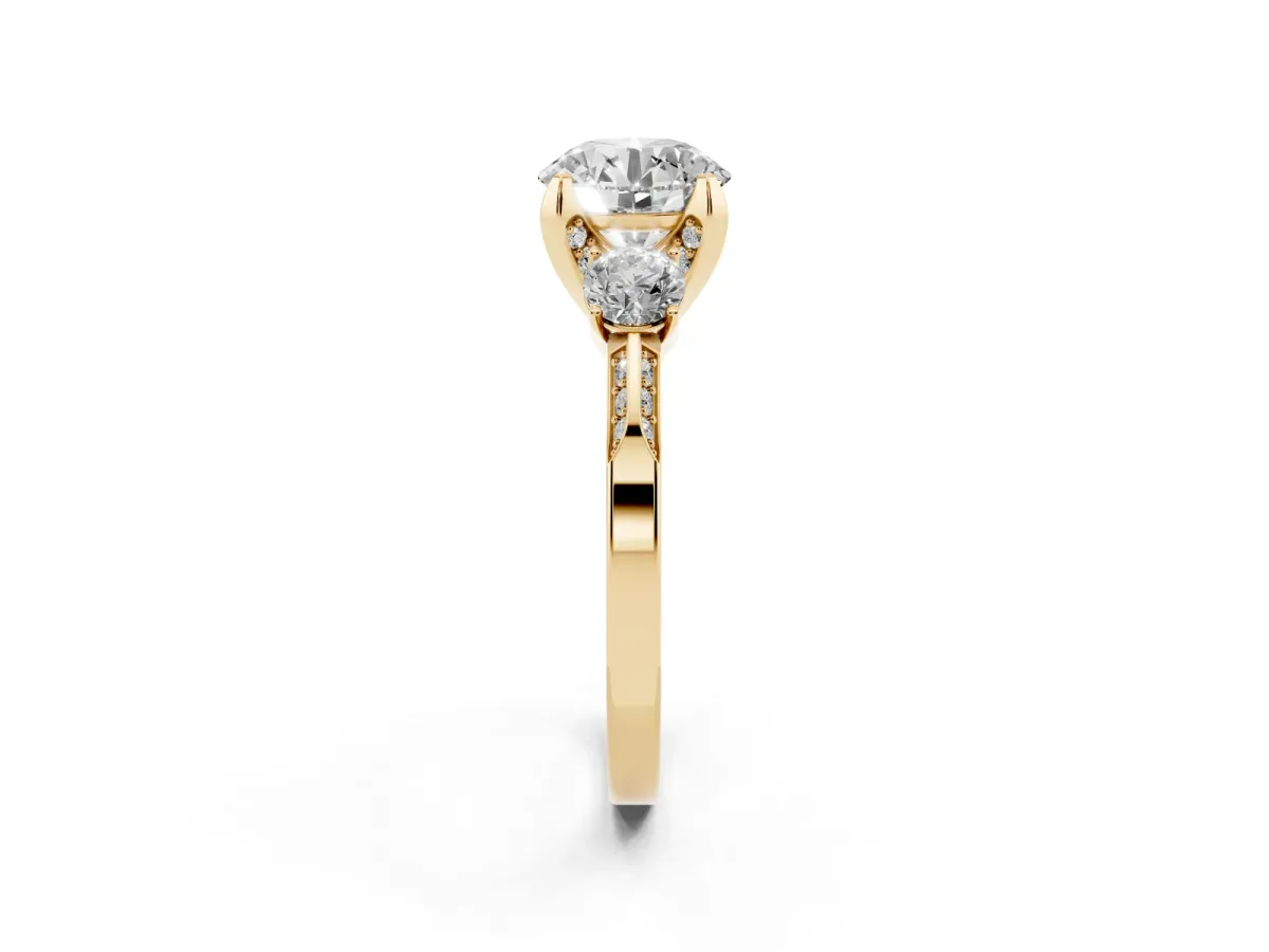 Round Cut Brilliant Three-Stone Diamond Ring with Pavé Band and Four-Prong Setting Yellow gold