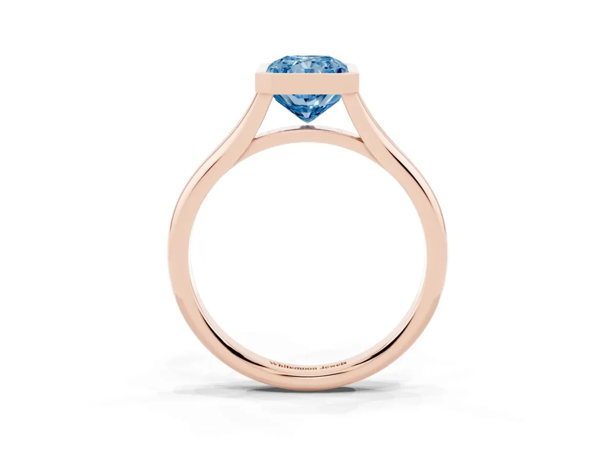 Fancy Blue Bezel Set Radiant Cut Cut Solitaire Ring with Tapered Band Rose gold