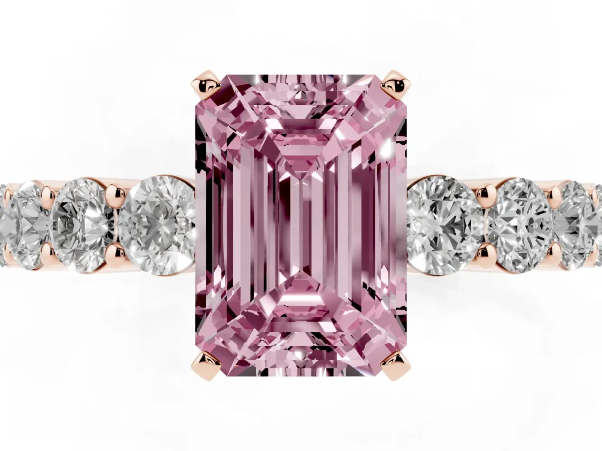 Fancy Pink Emerald Cut Diamond Solitaire Ring with Shared Prong Round Side Stones Rose gold