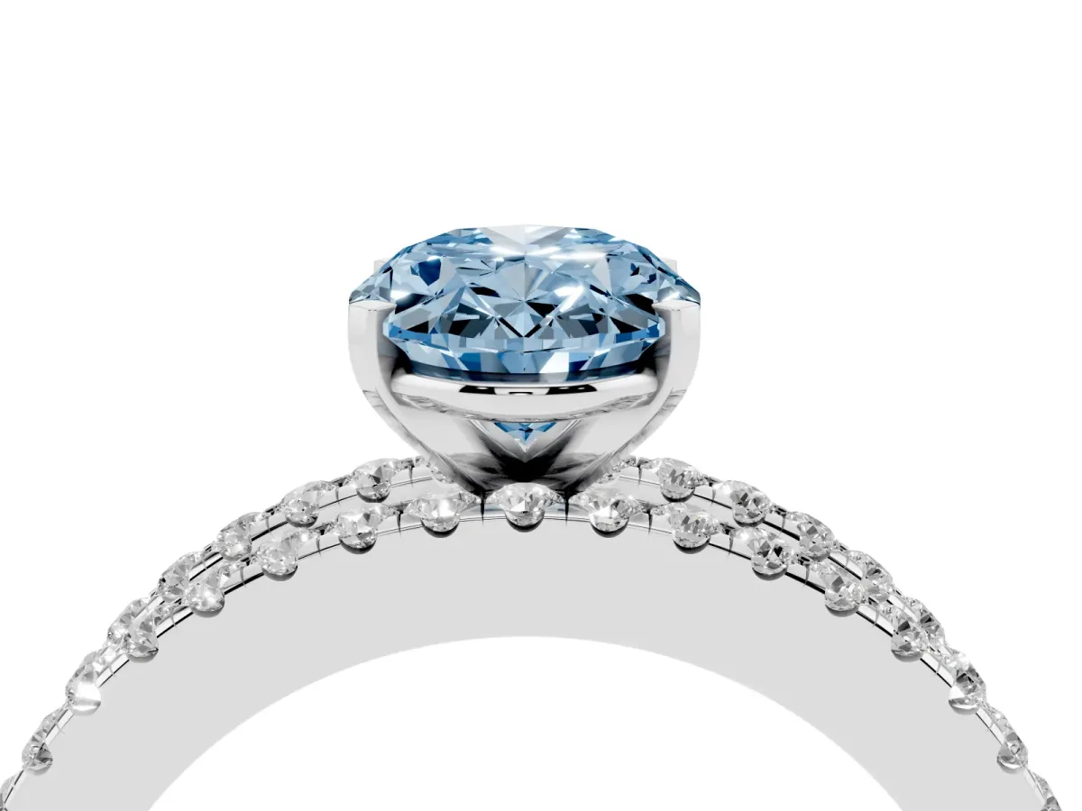 Fancy Blue Oval Cut Diamond Solitaire Ring with Pavé and Channel Set Band Silver