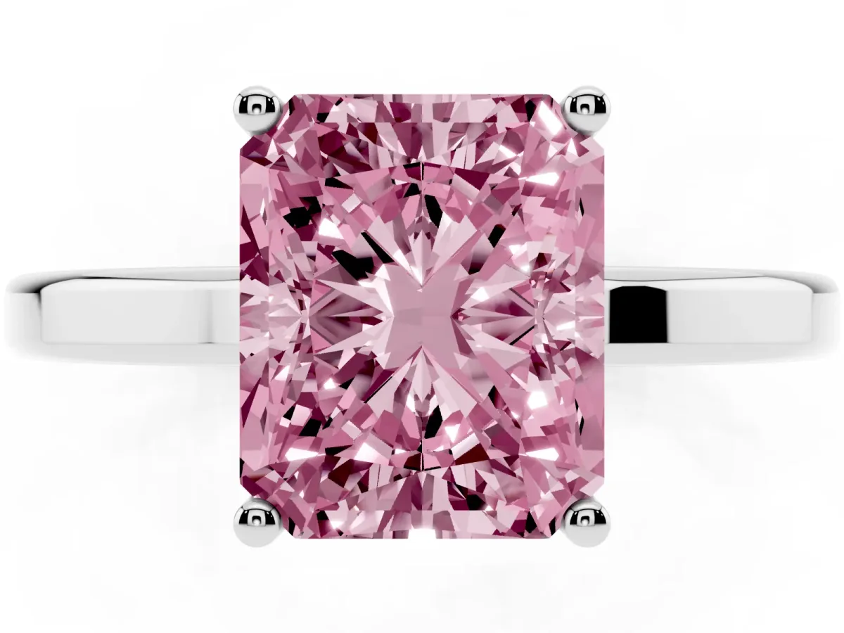 Fancy Pink Radiant Cut Cut Solitaire Engagement Ring with Four-Prong Setting on a Classic Band Silver