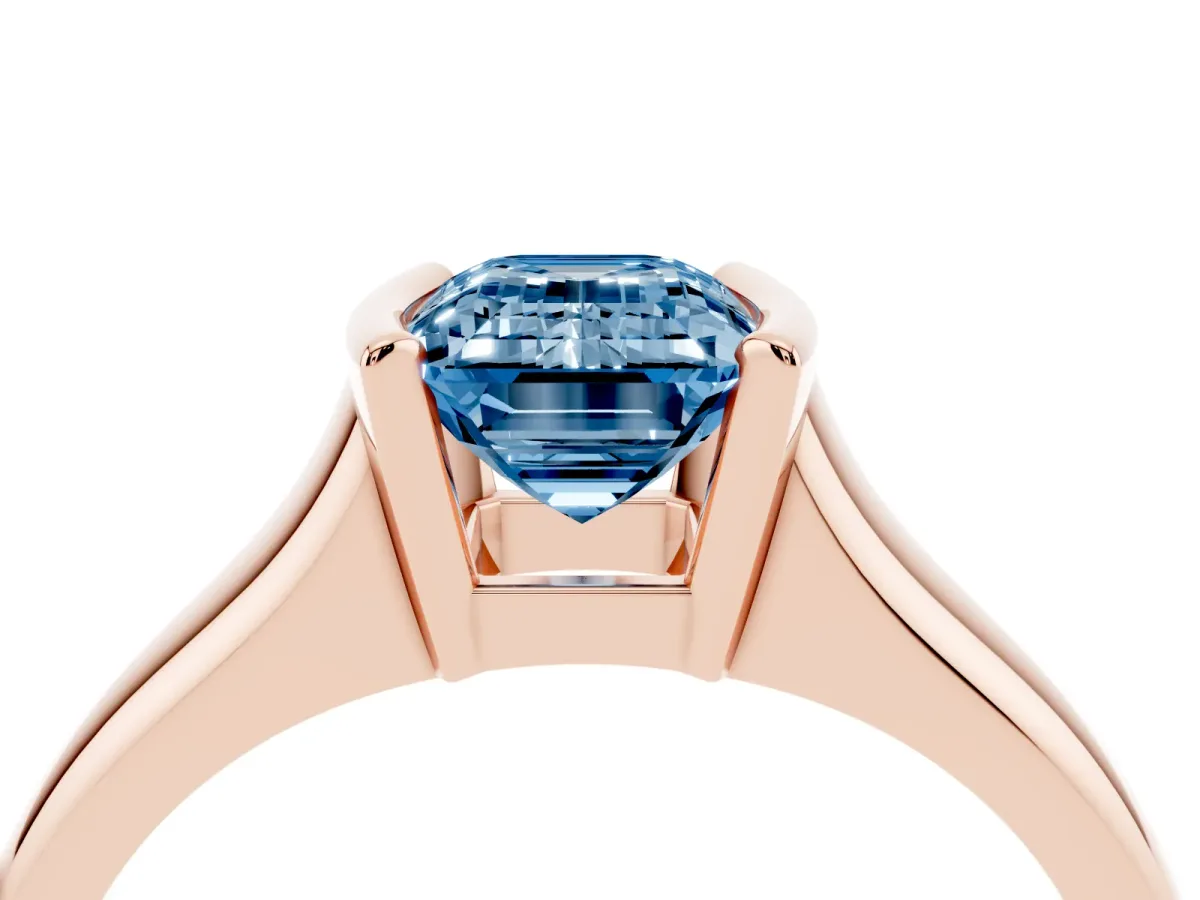 Fancy Blue Emerald Cut Solitaire Tension Set Diamond Ring with Split Shank Band Rose gold