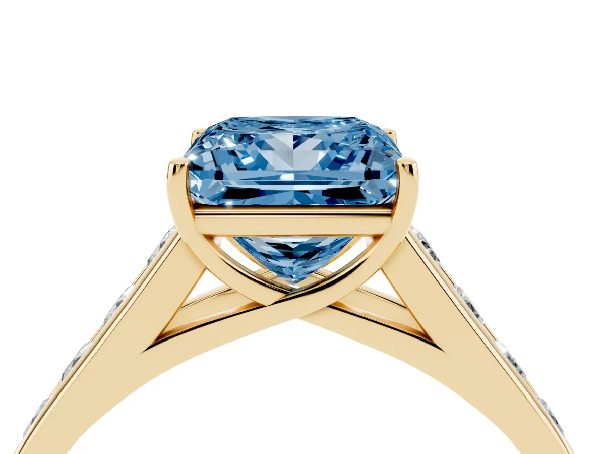 Fancy Blue Princess Cut Brilliant Channel-Set Solitaire Ring with Four-Prong Setting Yellow gold