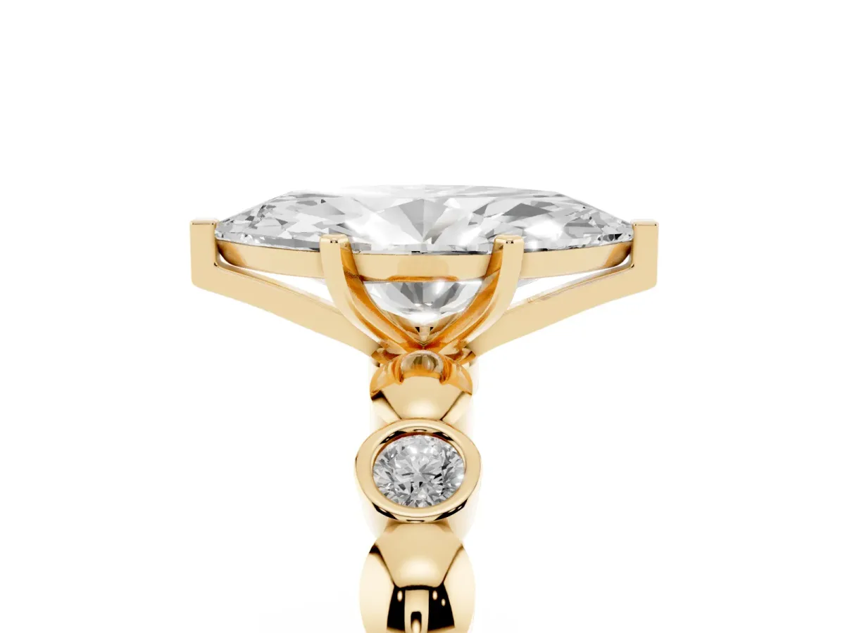Marquise Cut Solitaire Bezel-Set Diamond Ring with Beaded Band and Four-Prong Setting Yellow gold