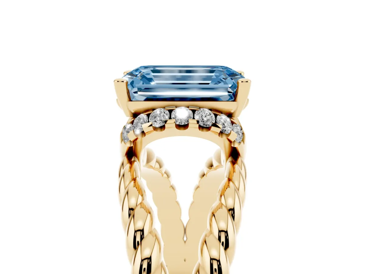 Fancy Blue Emerald Cut Halo Twisted Band Four-Prong Ring Yellow gold