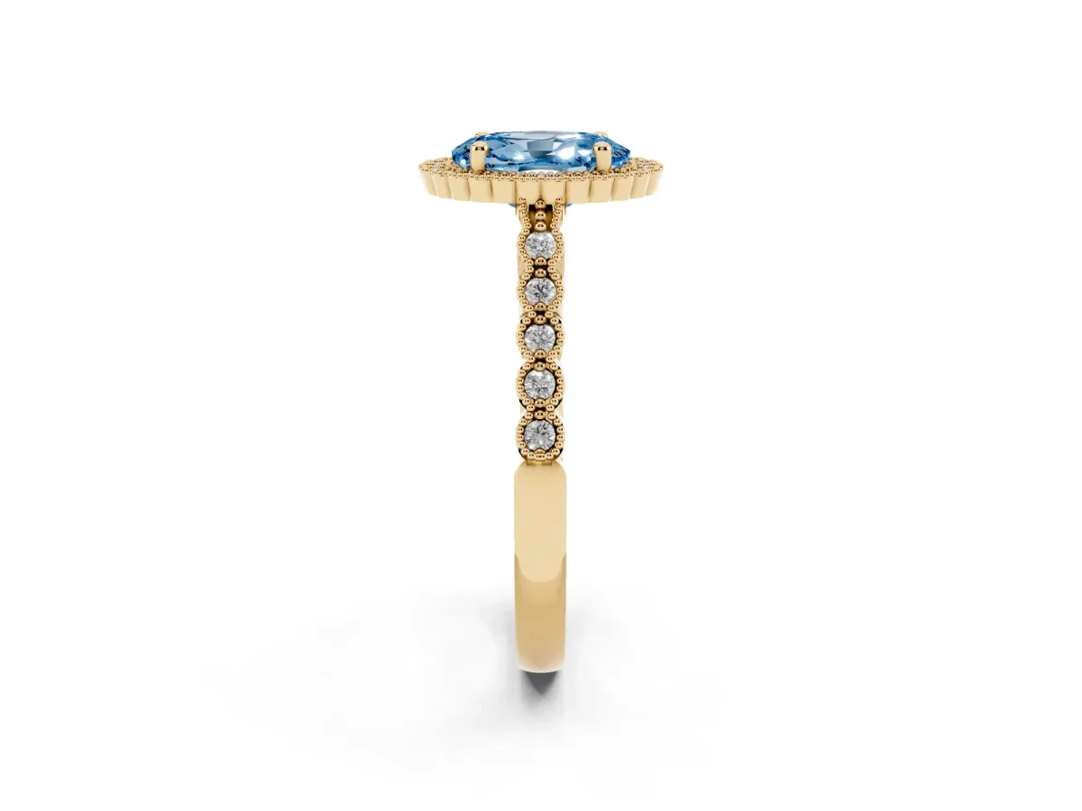 Fancy Blue Oval Cut Cut Halo Pavé Solitaire Ring with Milgrain Band Yellow gold