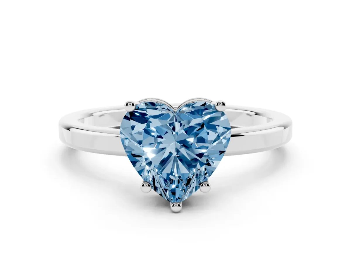 Fancy Blue Heart Cut Cut Solitaire Engagement Ring with Four-Prong Setting on a Classic Band Silver