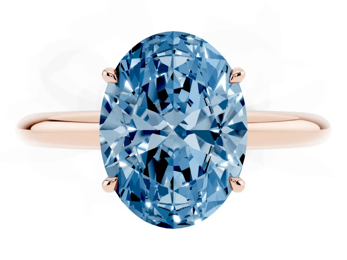 Fancy Blue Oval Cut Brilliant Solitaire Engagement Ring with Six-Prong Setting and Classic Band Rose gold