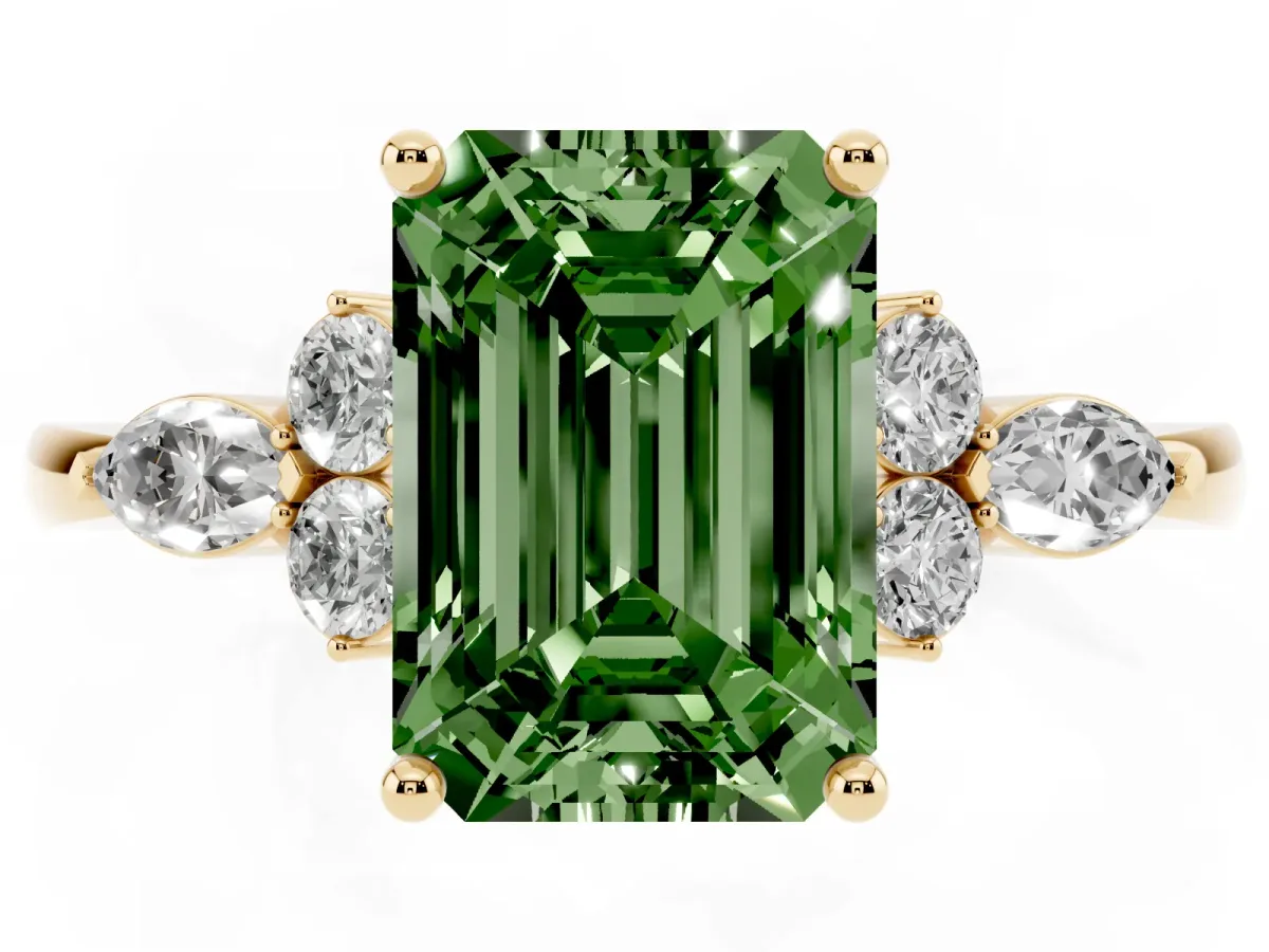 Fancy Green Emerald Cut Brilliant Diamond Solitaire Ring with Pear Side Stones and Four-Prong Setting Yellow gold