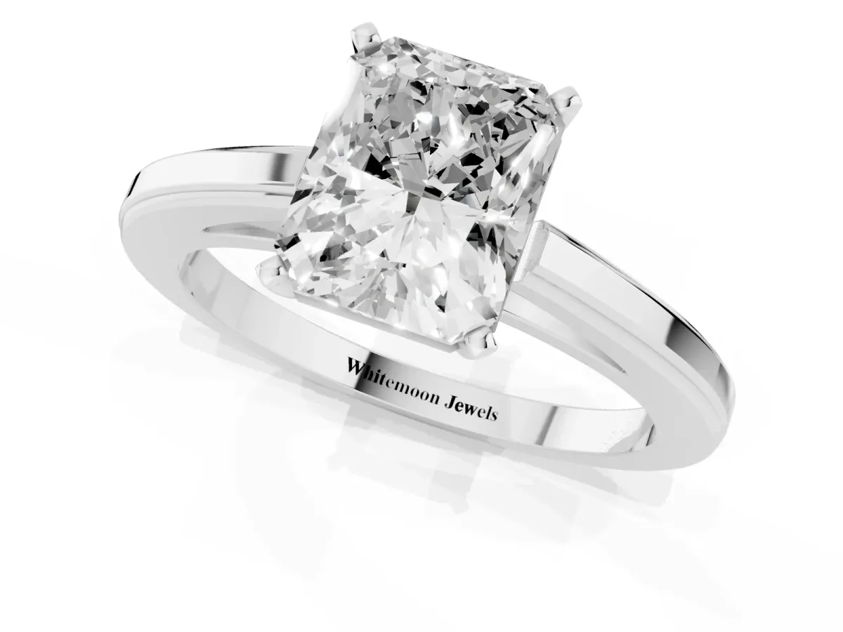 Radiant Cut Solitaire Diamond Ring with Four-Prong Setting and Classic Band Silver