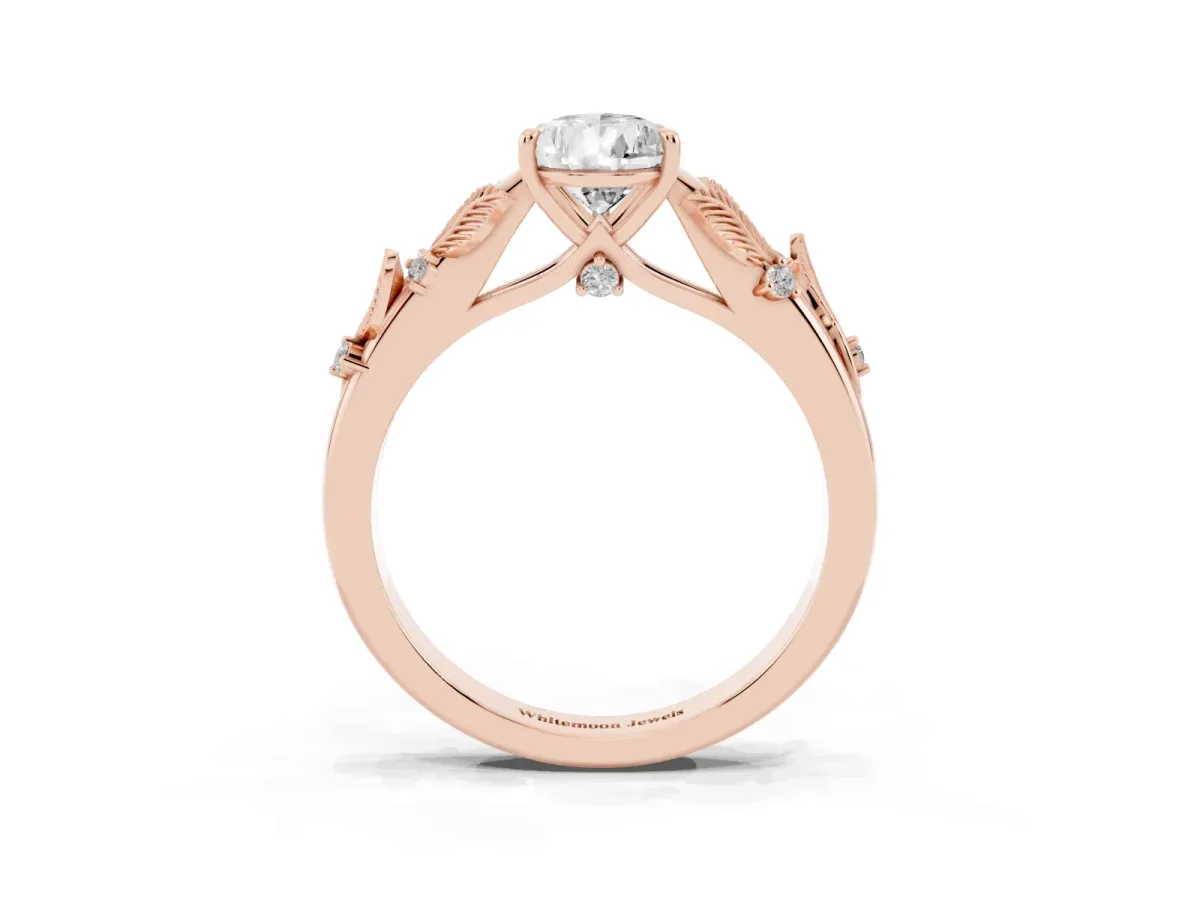 Pear Cut Diamond Solitaire Ring with Leaf Motif Band and Four-Prong Setting Rose gold