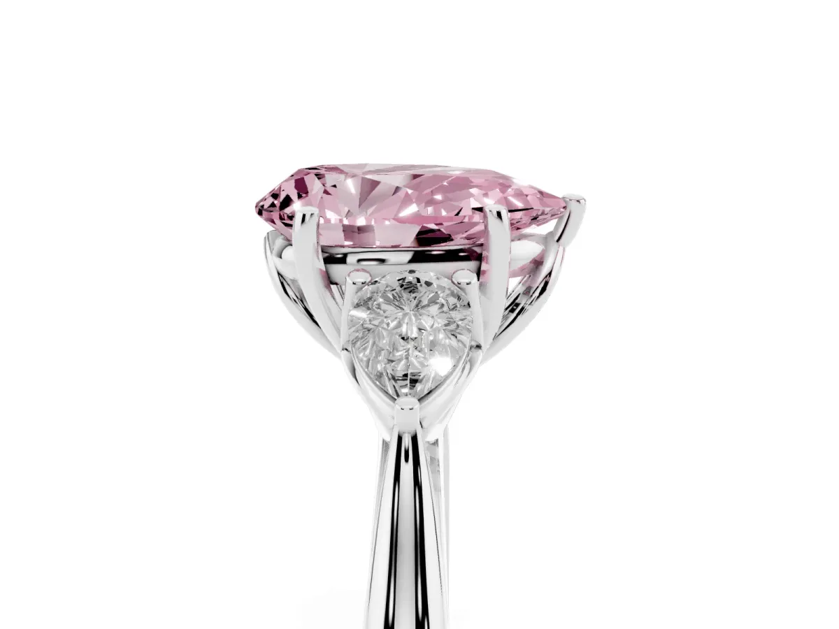 Fancy Pink Three-Stone Pear Cut Brilliant Diamond Solitaire Ring with Tapered Band and Four-Prong Setting White gold