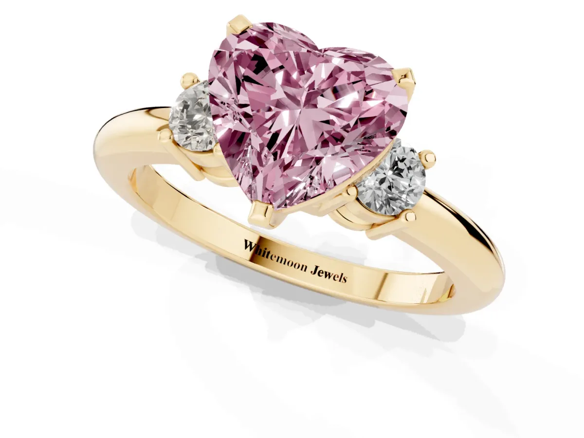 Fancy Pink Three-Stone Heart Cut Cut Diamond Solitaire with Prong Setting and Classic Band Yellow gold