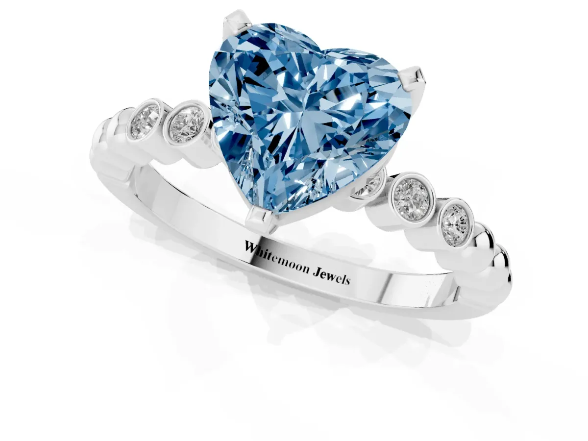 Fancy Blue Heart Cut Solitaire Bezel Accent Diamond Engagement Ring with Beaded Band and Four-Prong Setting Platinum