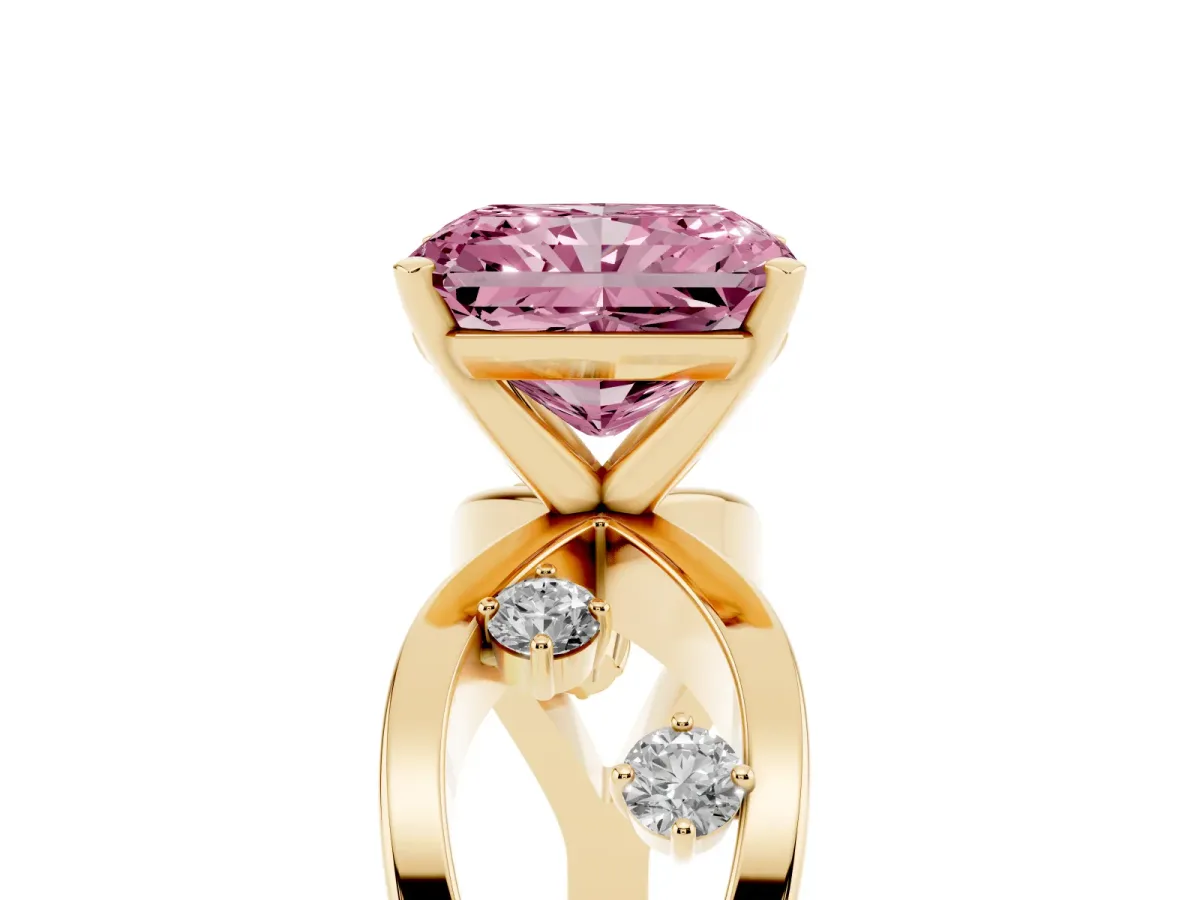 Fancy Pink Radiant Cut Cut Solitaire Diamond with Side Stones on Criss-Cross Band and Four-Prong Setting Yellow gold