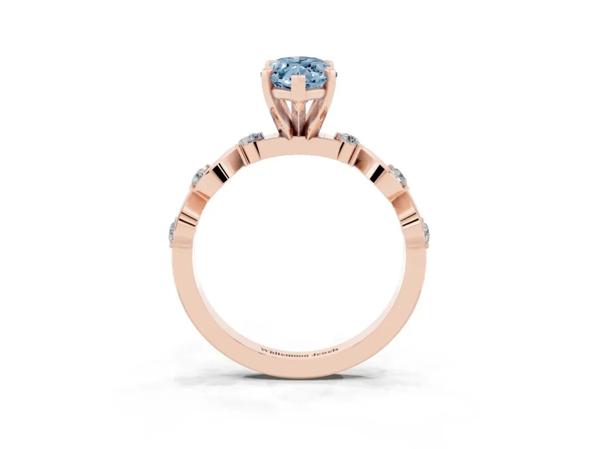 Fancy Blue Marquise Cut Diamond Solitaire Twisted Band with Round Accents and Prong Setting Rose gold
