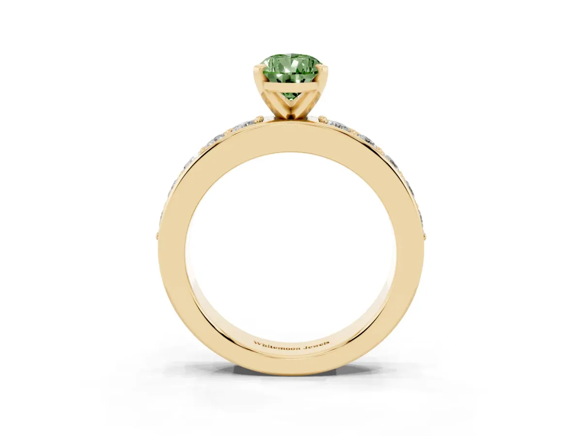 Fancy Green Pear Cut Diamond Engagement Ring with Channel Set Round Band and Prong Setting Yellow gold