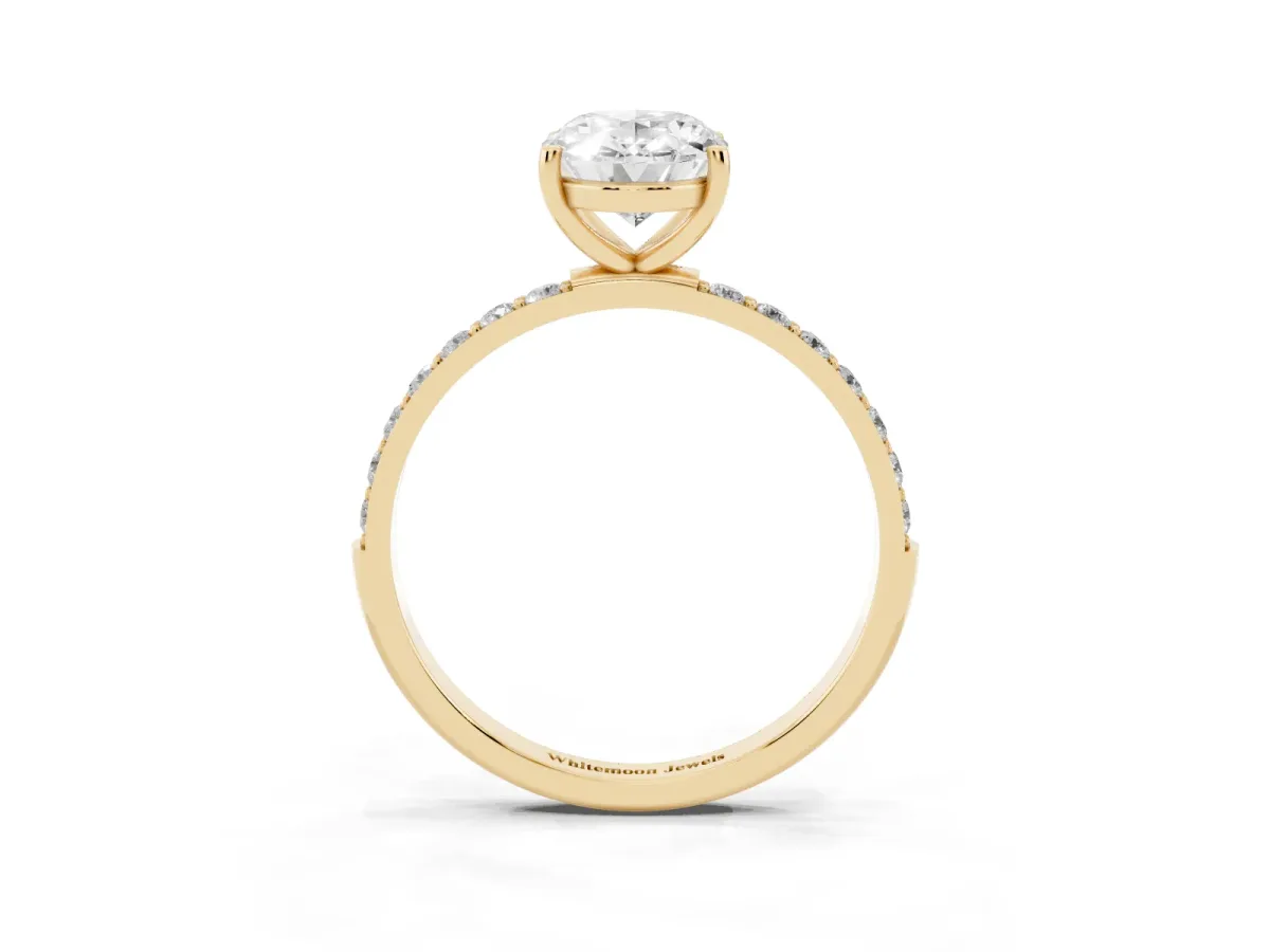 Oval Cut Diamond Solitaire Ring with Round Pavé Shoulders and Prong Setting Yellow gold