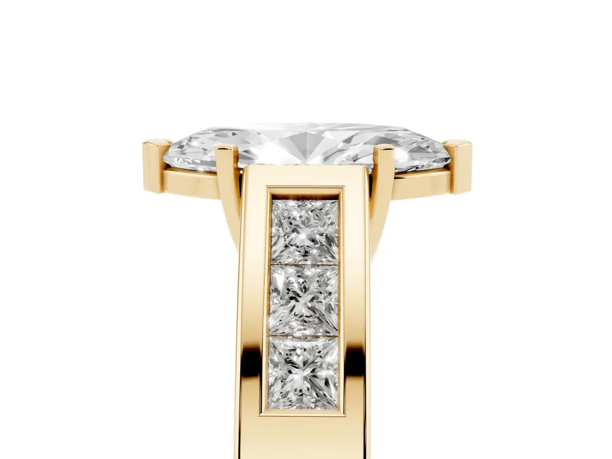 Marquise Cut Cut Channel Set Solitaire Ring with Four-Prong Setting Yellow gold