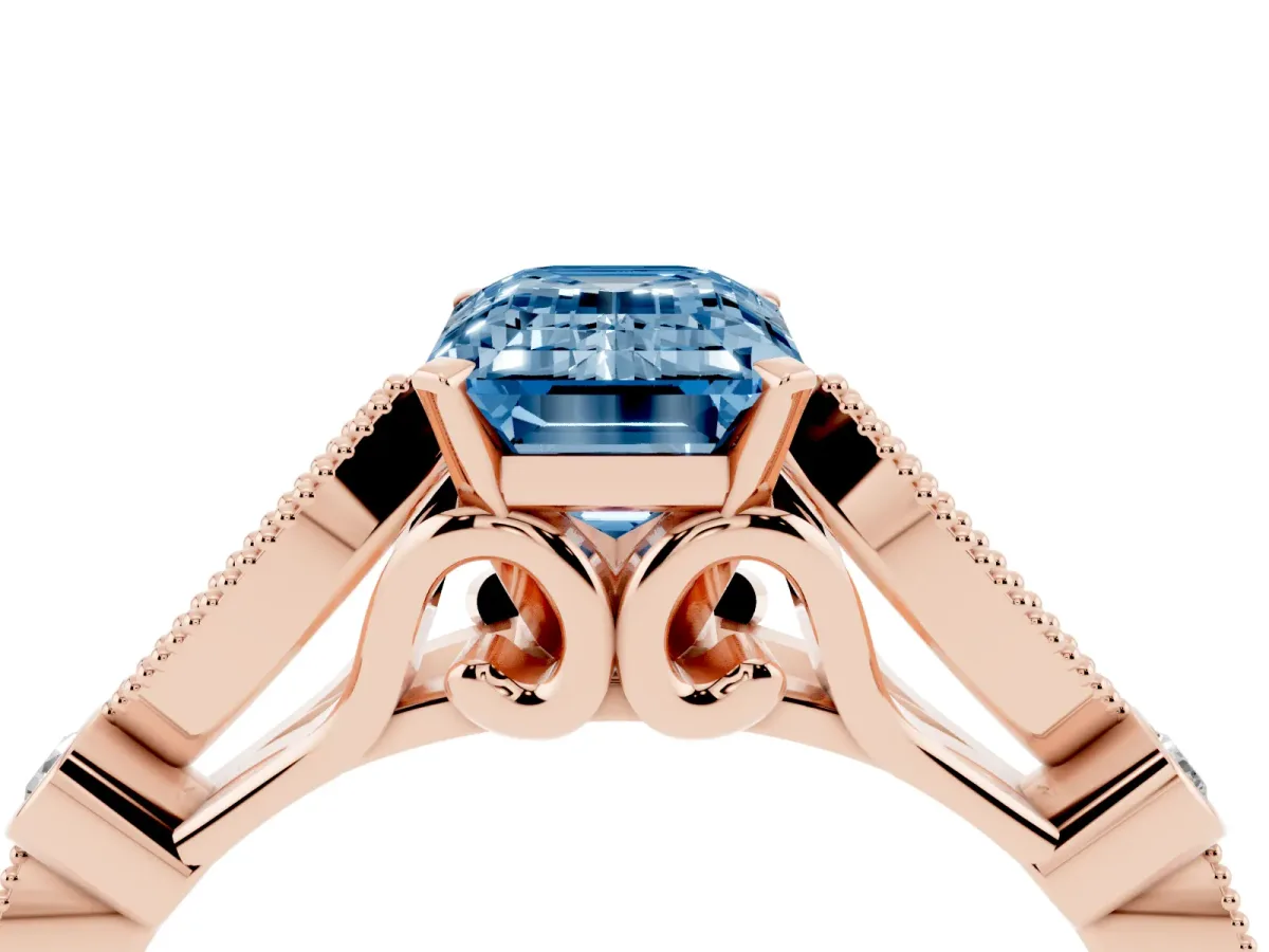 Fancy Blue Emerald Cut Cut Diamond with Milgrain Marquise and Bezel Accents on a Solitaire Band with Prong Setting Rose gold