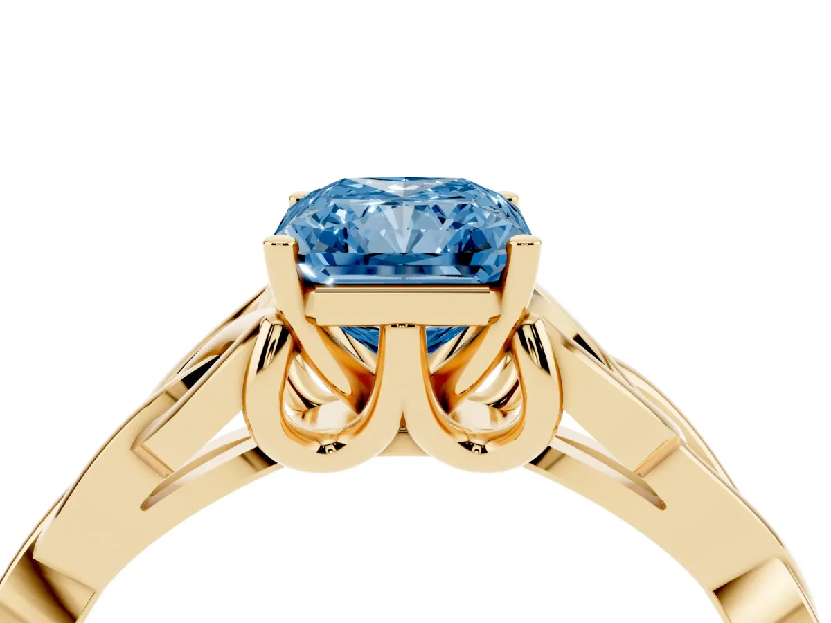 Fancy Blue Radiant Cut Diamond Solitaire Engagement Ring with Celtic Knot Band and Four-Prong Setting Yellow gold