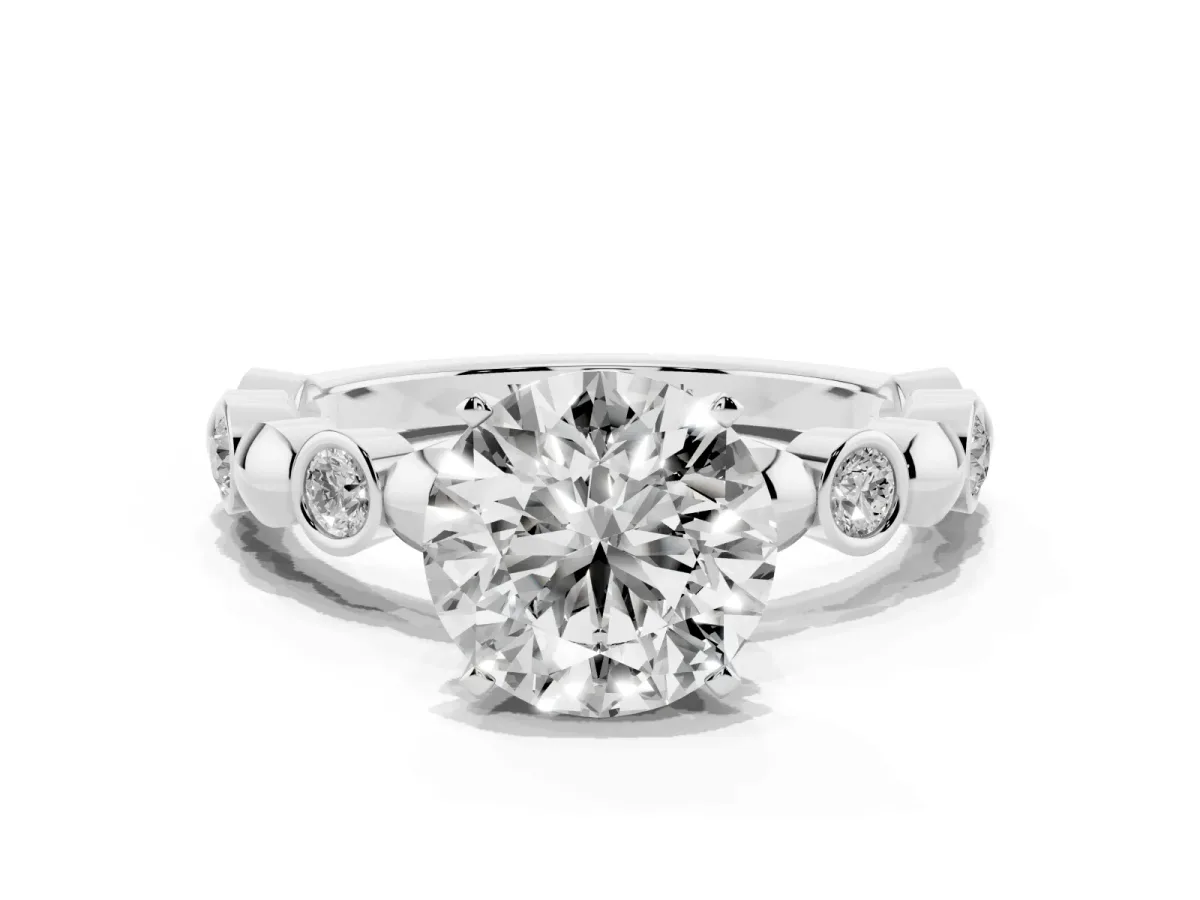 Round Cut Solitaire Bezel-Set Diamond Ring with Beaded Band and Four-Prong Setting Silver