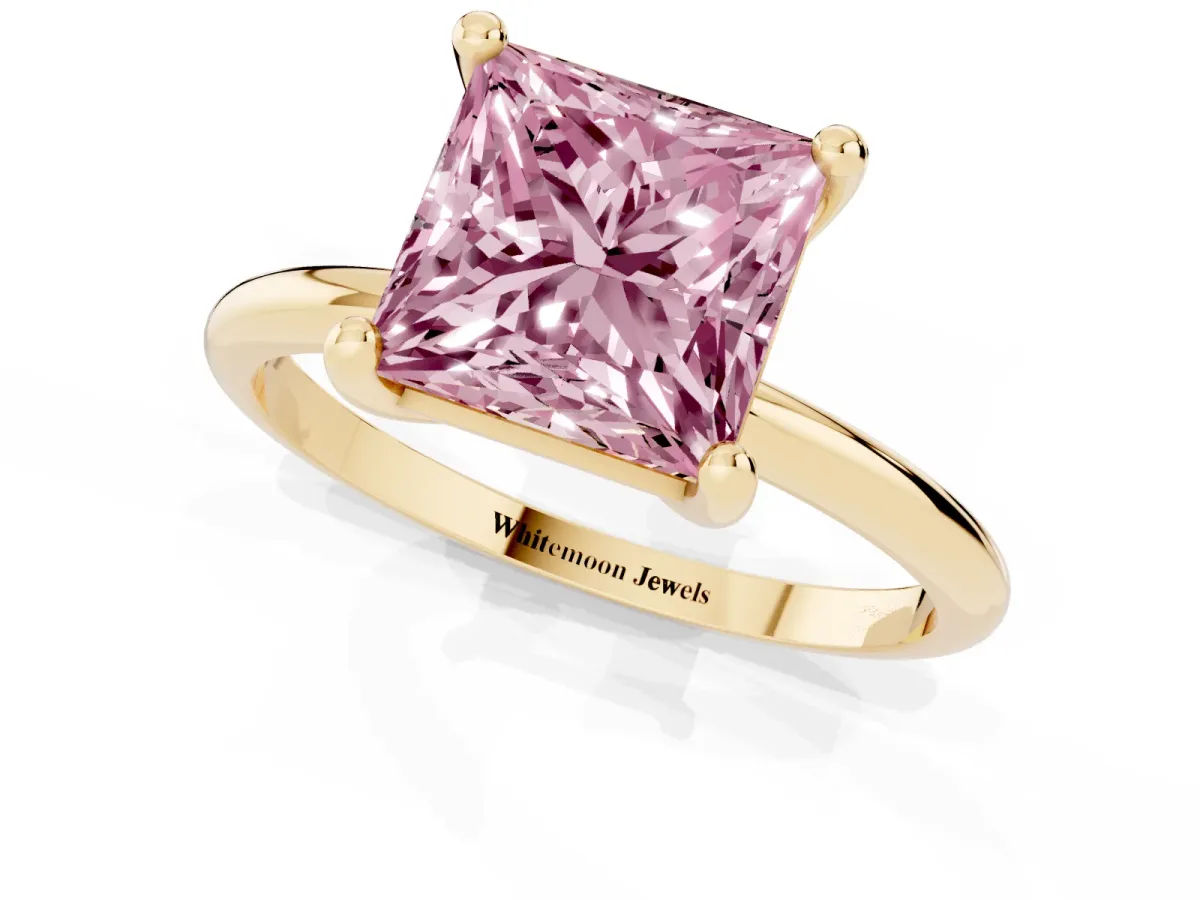 Fancy Pink Princess Cut Solitaire Diamond Ring with 4-Prong Setting on a Classic Band Yellow gold