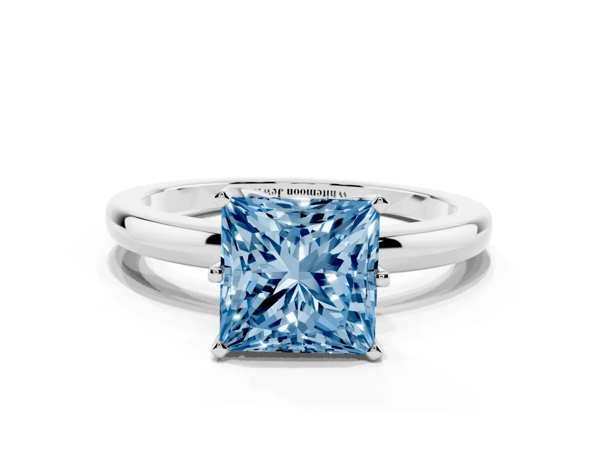 Fancy Blue Princess Cut Solitaire Diamond Ring with Six-Prong Setting on a Classic Band Silver