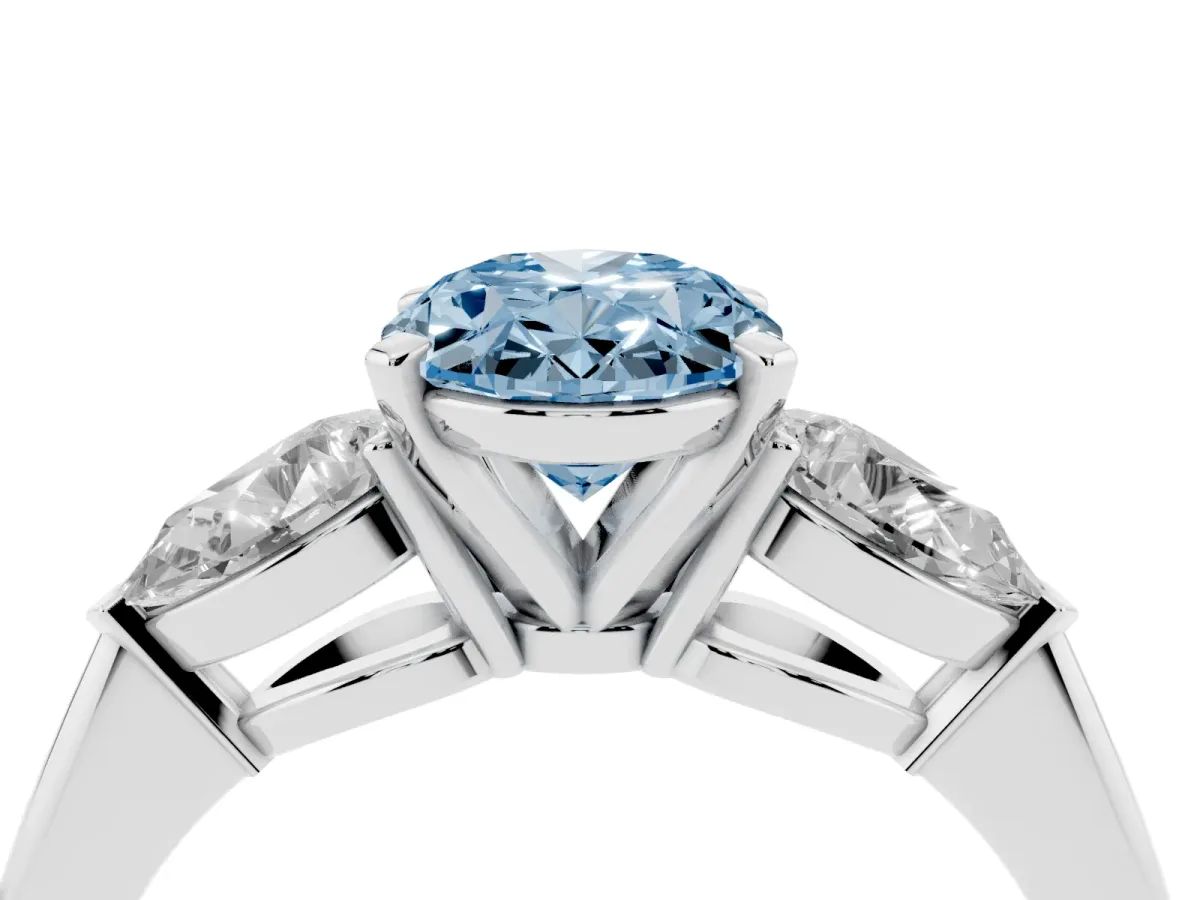 Fancy Blue Three-Stone Oval Cut Diamond Ring with Pear Side Stones and Four-Prong Setting Platinum