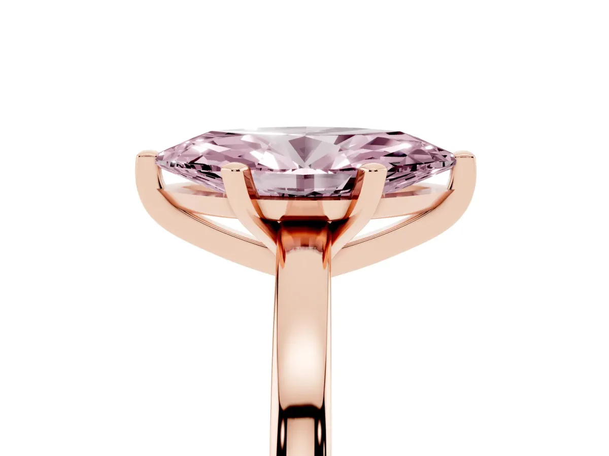 Fancy Pink Marquise Cut Solitaire Diamond Engagement Ring with Four-Prong Setting on a Classic Band Rose gold