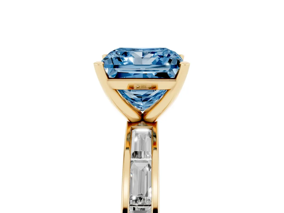 Fancy Blue Princess Cut Solitaire Diamond Ring with Channel-Set Baguette Band and Four-Prong Setting Yellow gold