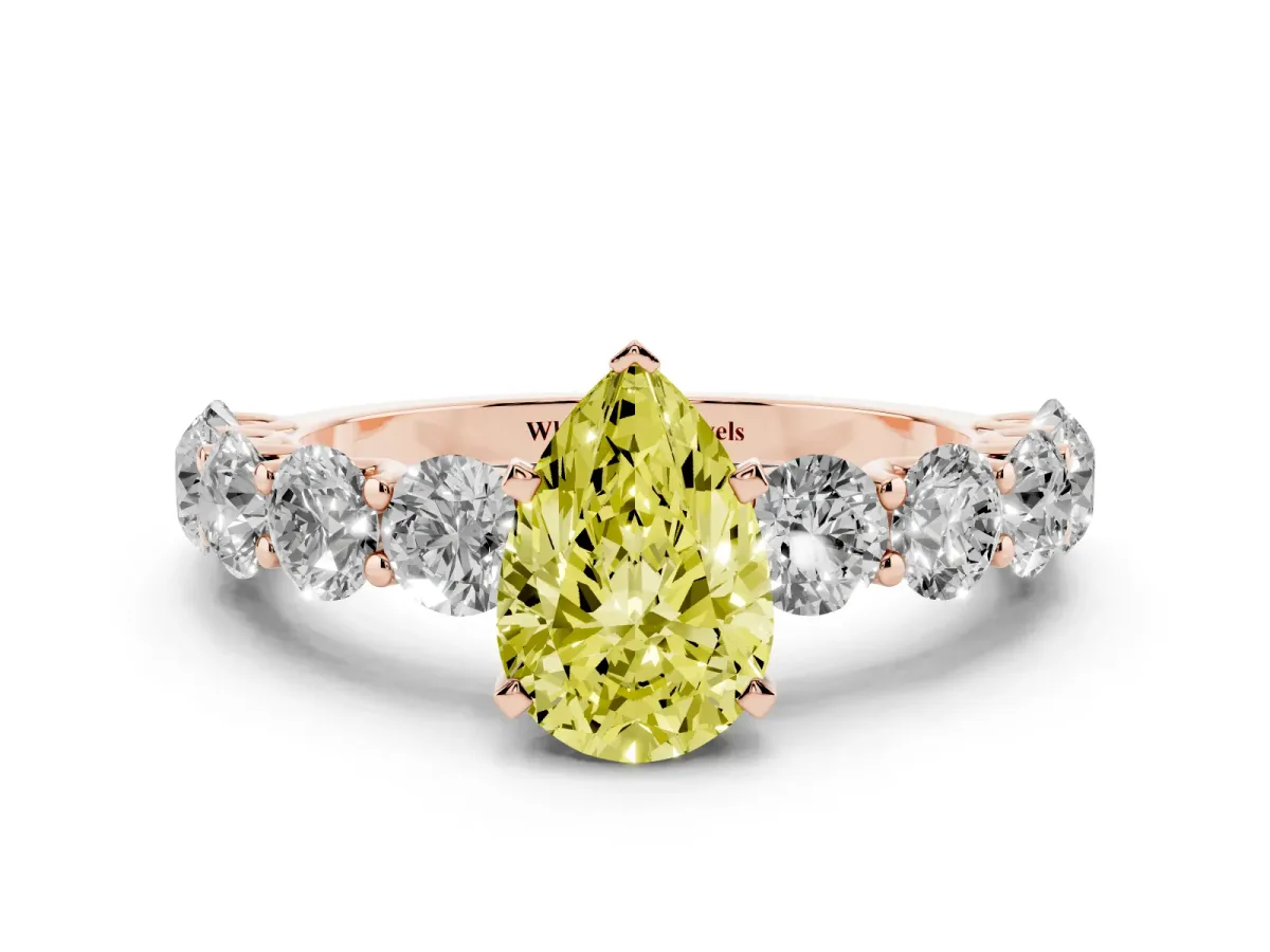 Fancy Yellow Pear Cut Diamond Prong Setting with Side Stones on a Pave Band Rose gold
