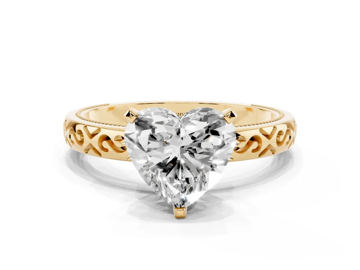 Heart Cut Solitaire Engagement Ring with Scrollwork Band and Four-Prong Setting Yellow gold