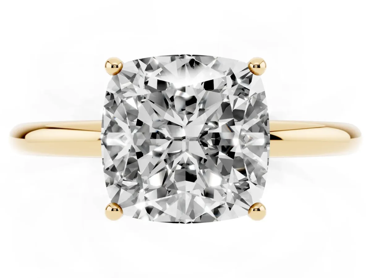 Cushion Cut Solitaire Diamond Ring with a Classic Band and Four-Prong Setting Yellow gold