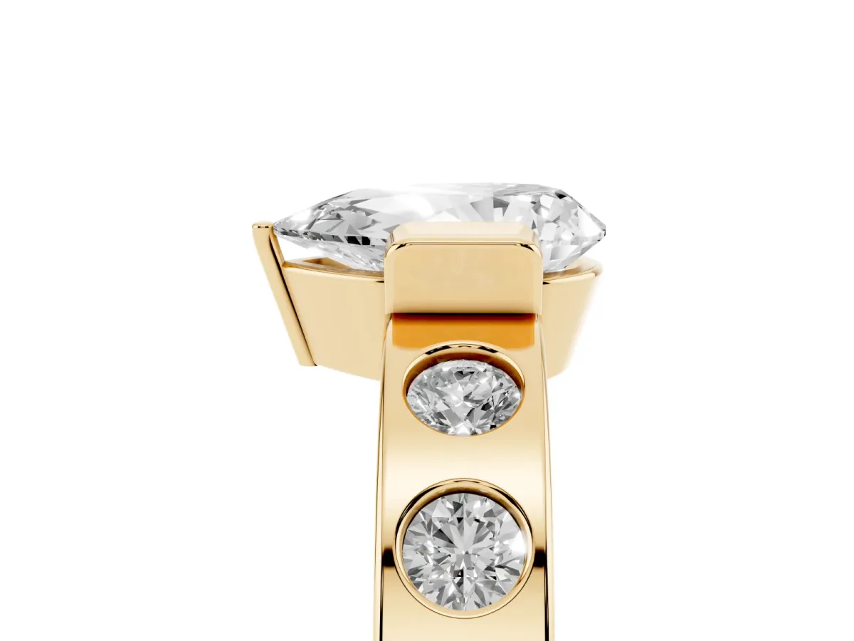 Pear Cut Brilliant Channel-Set Diamond Ring with Bezel Prong Setting Yellow gold