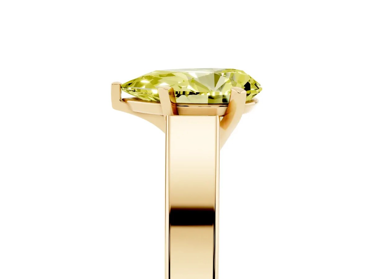 Fancy Yellow Pear Cut Solitaire Engagement Ring with Four-Prong Setting and Tapered Band Yellow gold