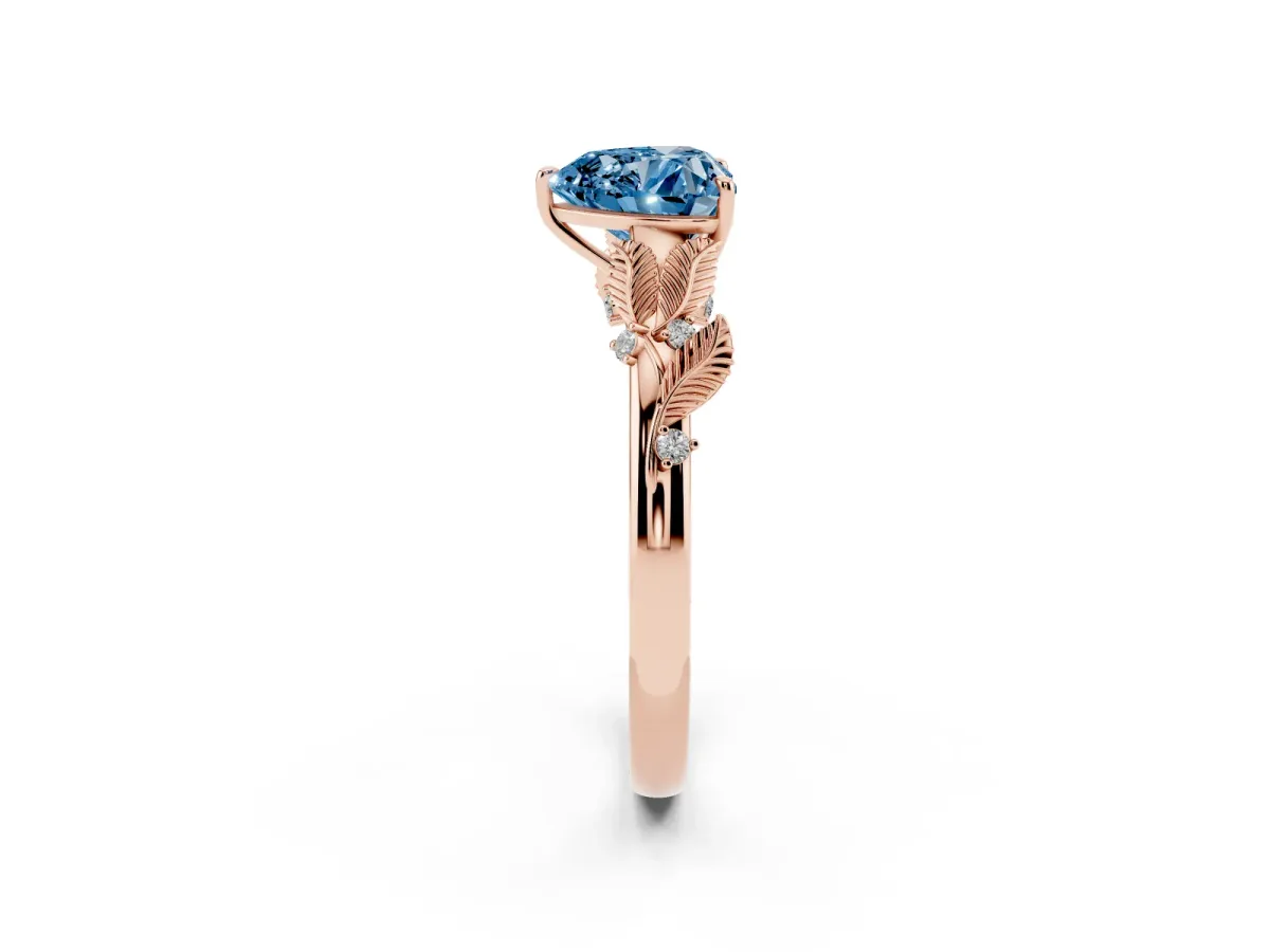 Fancy Blue Heart Cut Diamond Solitaire Ring with Leaf Motif Band and Four-Prong Setting Rose gold