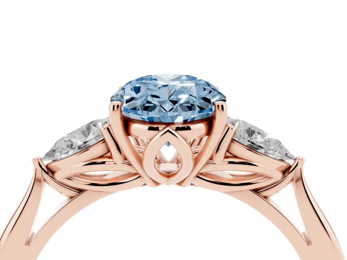 Fancy Blue Three-Stone Oval Cut Brilliant Diamond Solitaire Ring with Tapered Band and Four-Prong Setting Rose gold