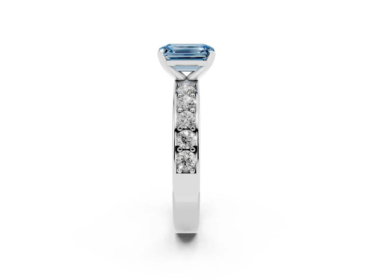 Fancy Blue Emerald Cut Diamond Engagement Ring with Channel Set Round Band and Prong Setting Silver