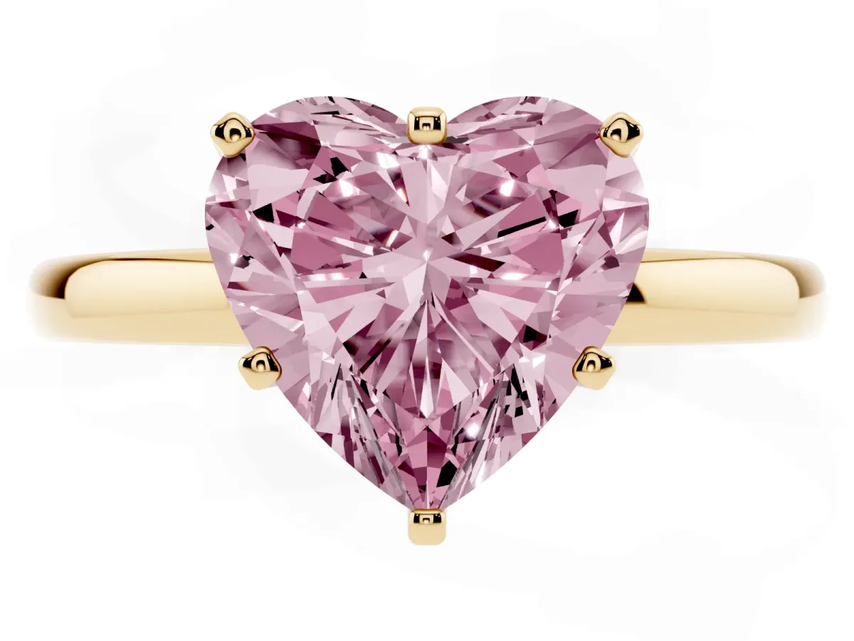 Fancy Pink Heart Cut Solitaire Diamond Ring with Six-Prong Setting on a Classic Band Yellow gold
