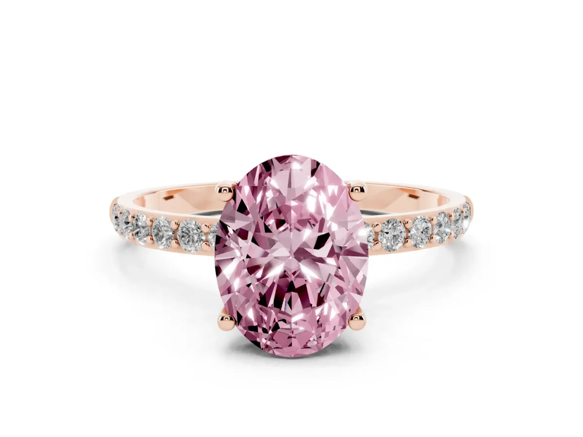 Fancy Pink Oval Cut Diamond Solitaire Ring with Round Pavé Shoulders and Prong Setting Rose gold