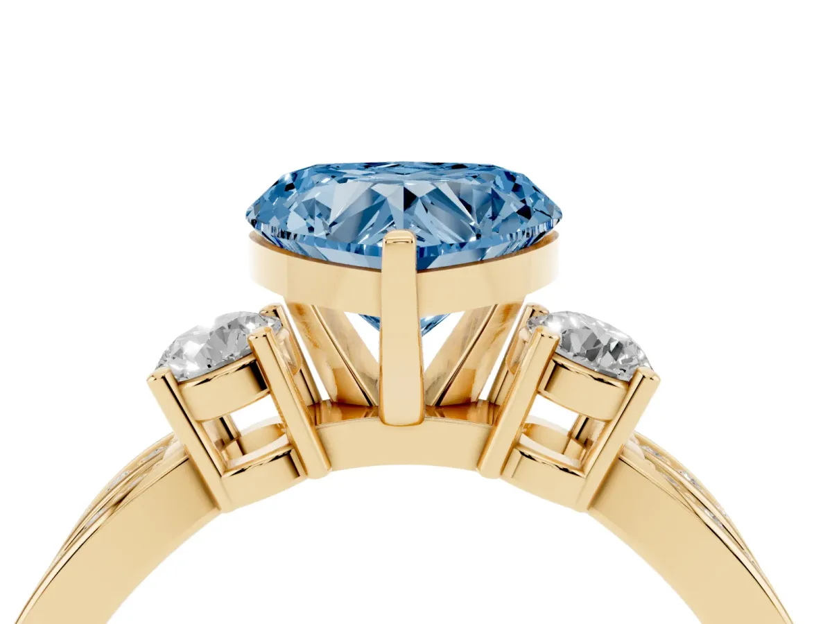 Fancy Blue Three-Stone Heart Cut Cut Diamond Twist Band with Prong Setting Yellow gold