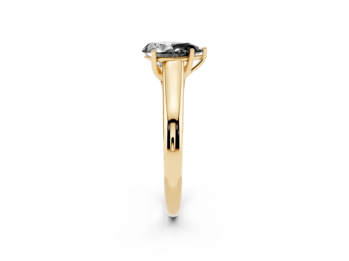 Fancy Black Pear Cut Solitaire Engagement Ring with Tapered Band and Four-Prong Setting Yellow gold