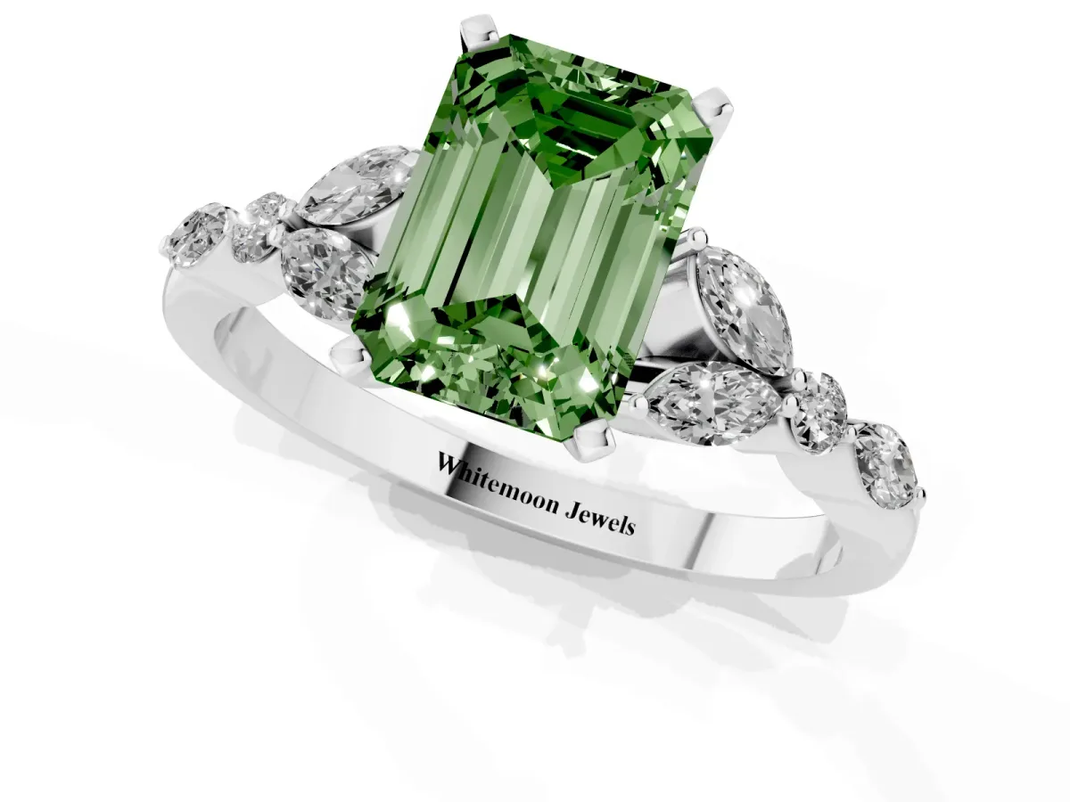 Fancy Green Emerald Cut Diamond Solitaire Ring with Side Stones and Four-Prong Setting Platinum
