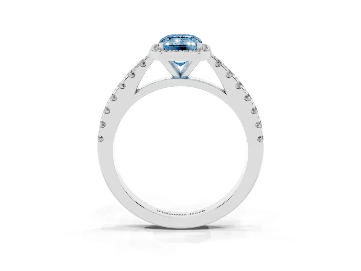 Fancy Blue Emerald Cut Cut Halo Diamond Engagement Ring with Pave Band and Four-Prong Setting White gold