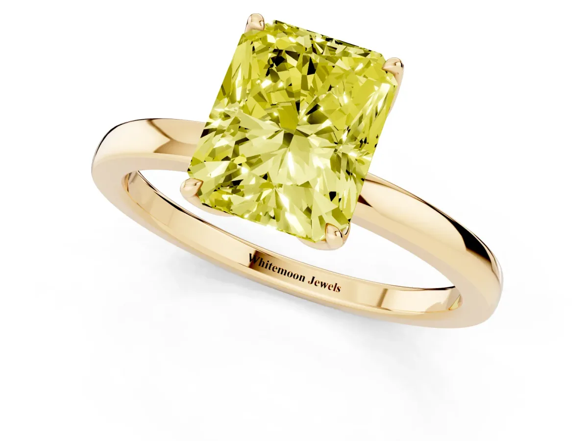 Fancy Yellow Radiant Cut Diamond Solitaire Ring with Thin Band and Prong Setting Yellow gold